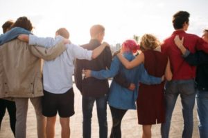a diverse group is able to open up to and support each other in group therapy for addiction treatment