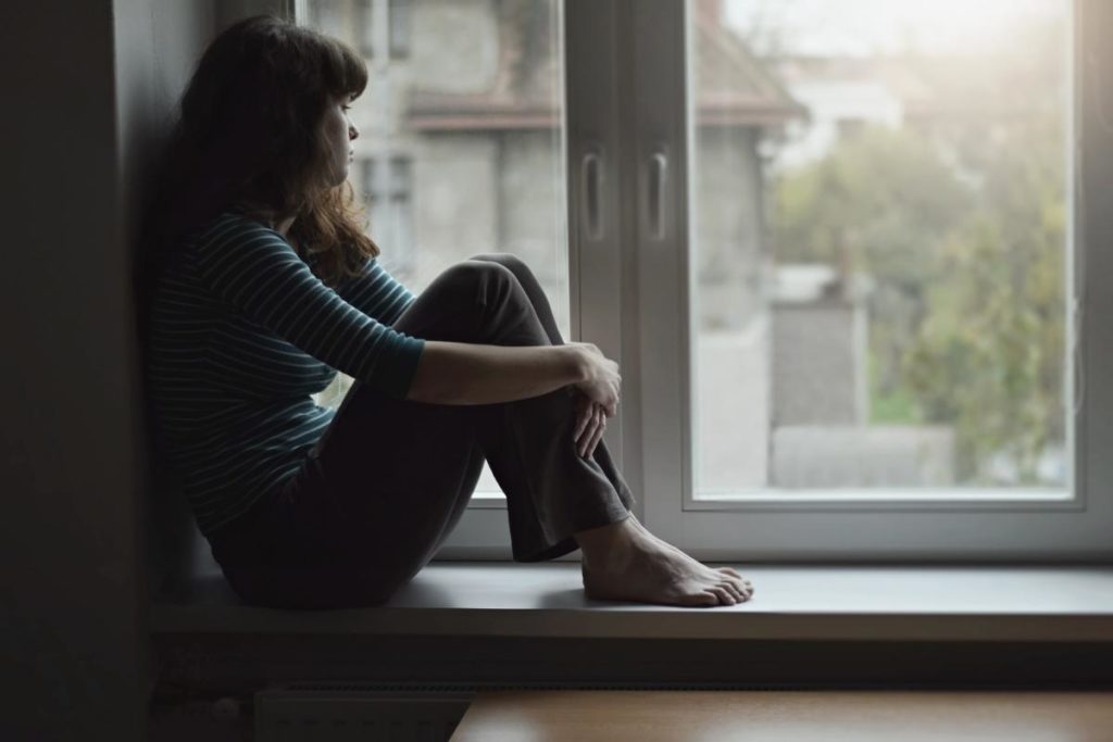 a woman becomes depressed when unable to fix her process addiction of gambling