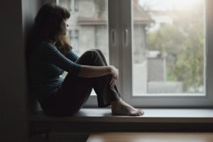 a woman becomes depressed when unable to fix her process addiction of gambling