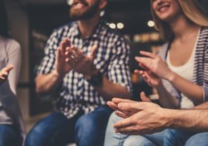 individuals receive help and support in a 12 step program for addiction 