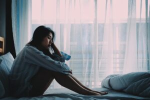 a woman self medicates her trauma with drugs and alcohol