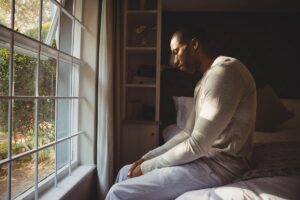 a man recognizes that his binge drinking has become a problem