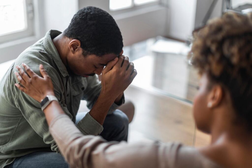 a man opens up in relapse prevention therapy