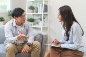 a man opens up to a therapist in person centered therapy 