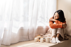 a young woman struggles to manage her seasonal depression without professional help