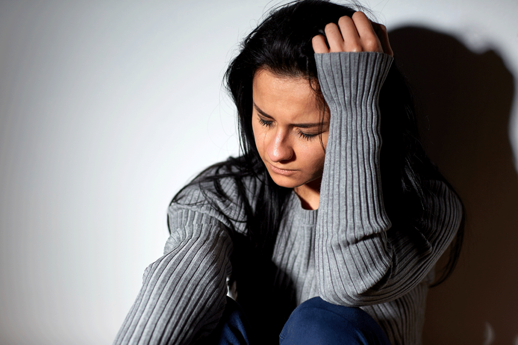 a woman struggles with the long term effects of heroin use