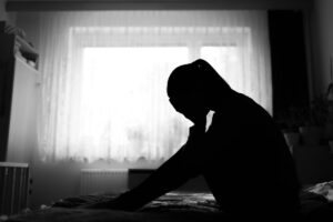 a woman struggles with polysubstance abuse mixing prescription drugs and alcohol