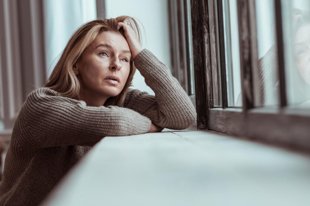 a woman struggles with unresolved childhood trauma